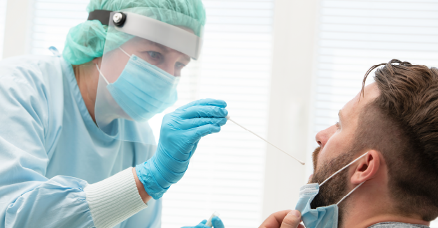 Pathologist taking a sample