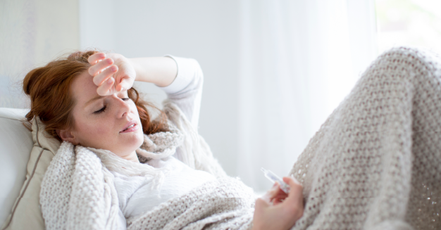 Woman lying down in pain