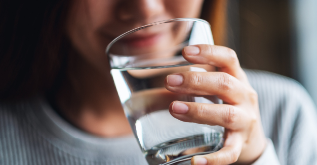 Woman drinking a glass of water